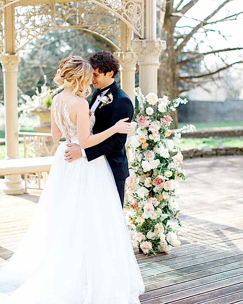 Husband and wife after outdoor ceremony at Eastington Park