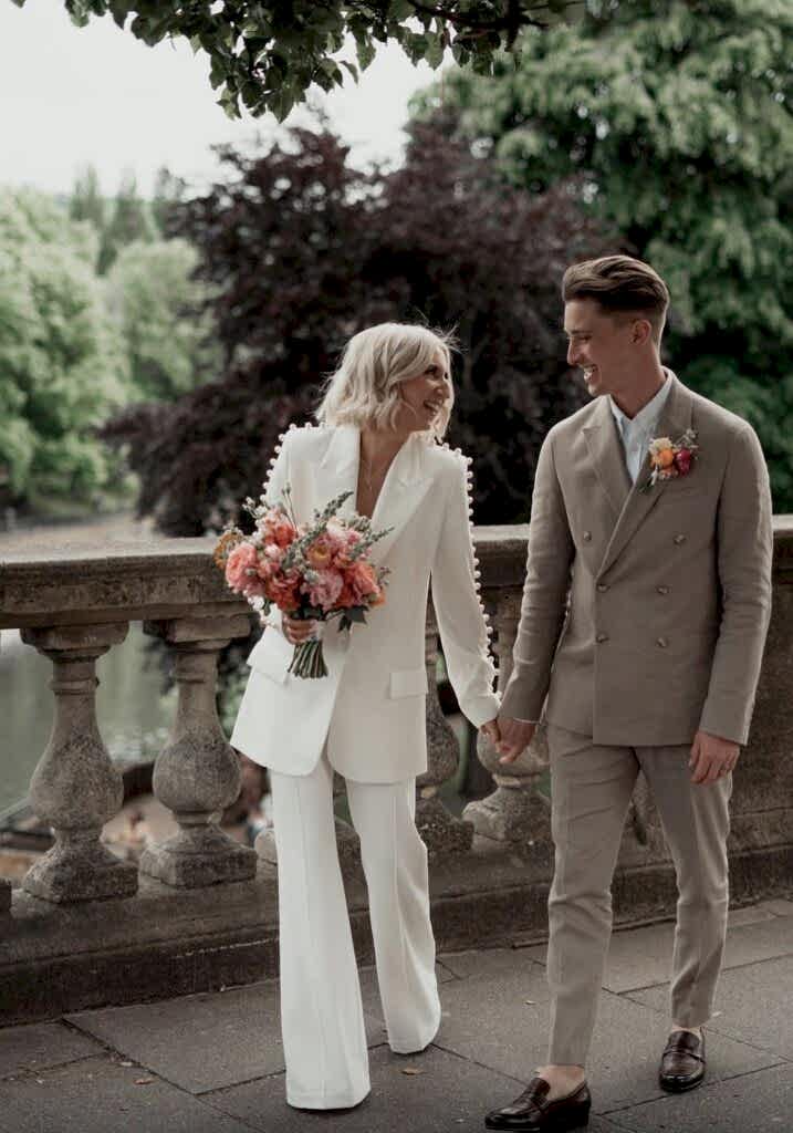 Bride and groom celebrating after tying the knot in Bath